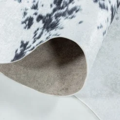 Etosha Vaskbart tæppe Imiteret koskind - Sort