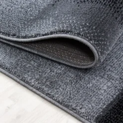 Parma Kortluvet tæppe Sten - Sort