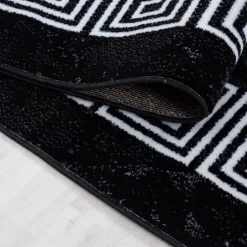 Plus Kortluvet tæppe Meander - Sort